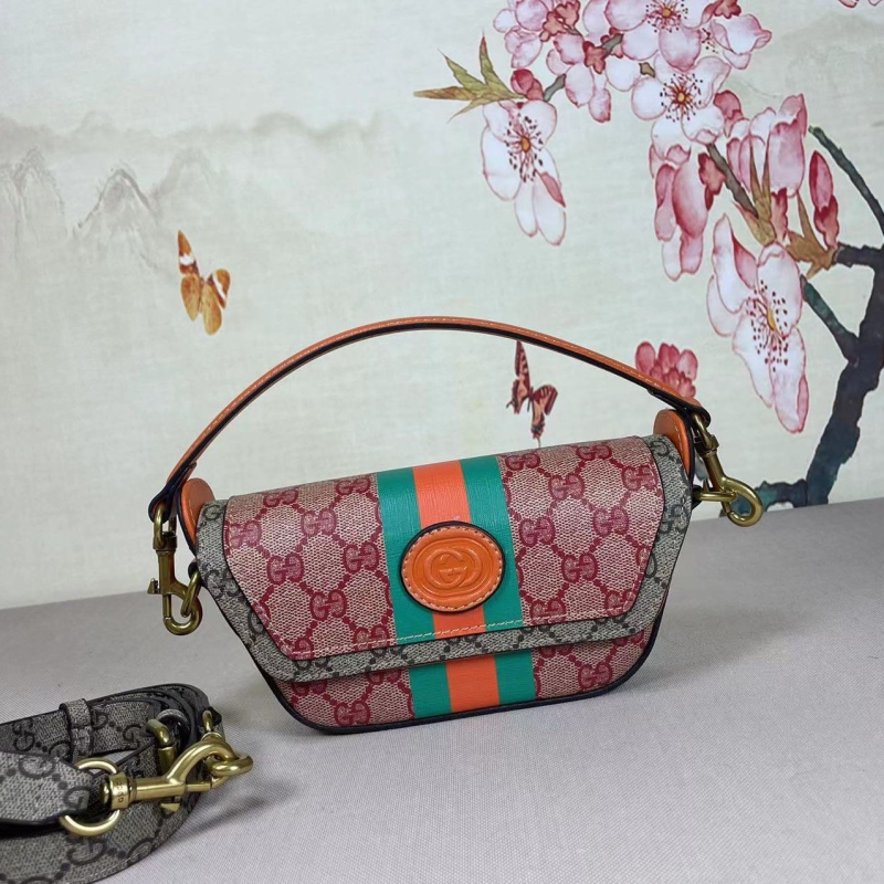 G*u*i top handle bags